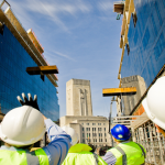 building-under-construction-with-workers-shutterstock_57862405
